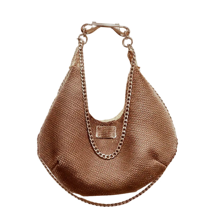 Brown handbag with chain detail on a white background