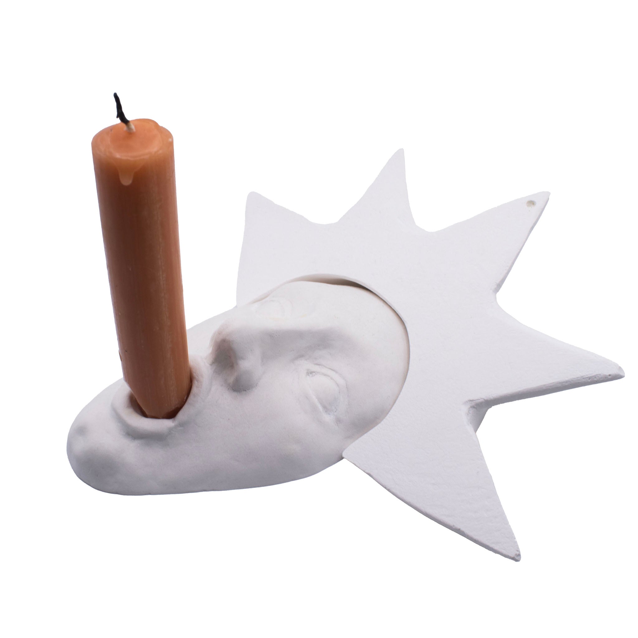 white acquacast sculpture of a face with a star crown